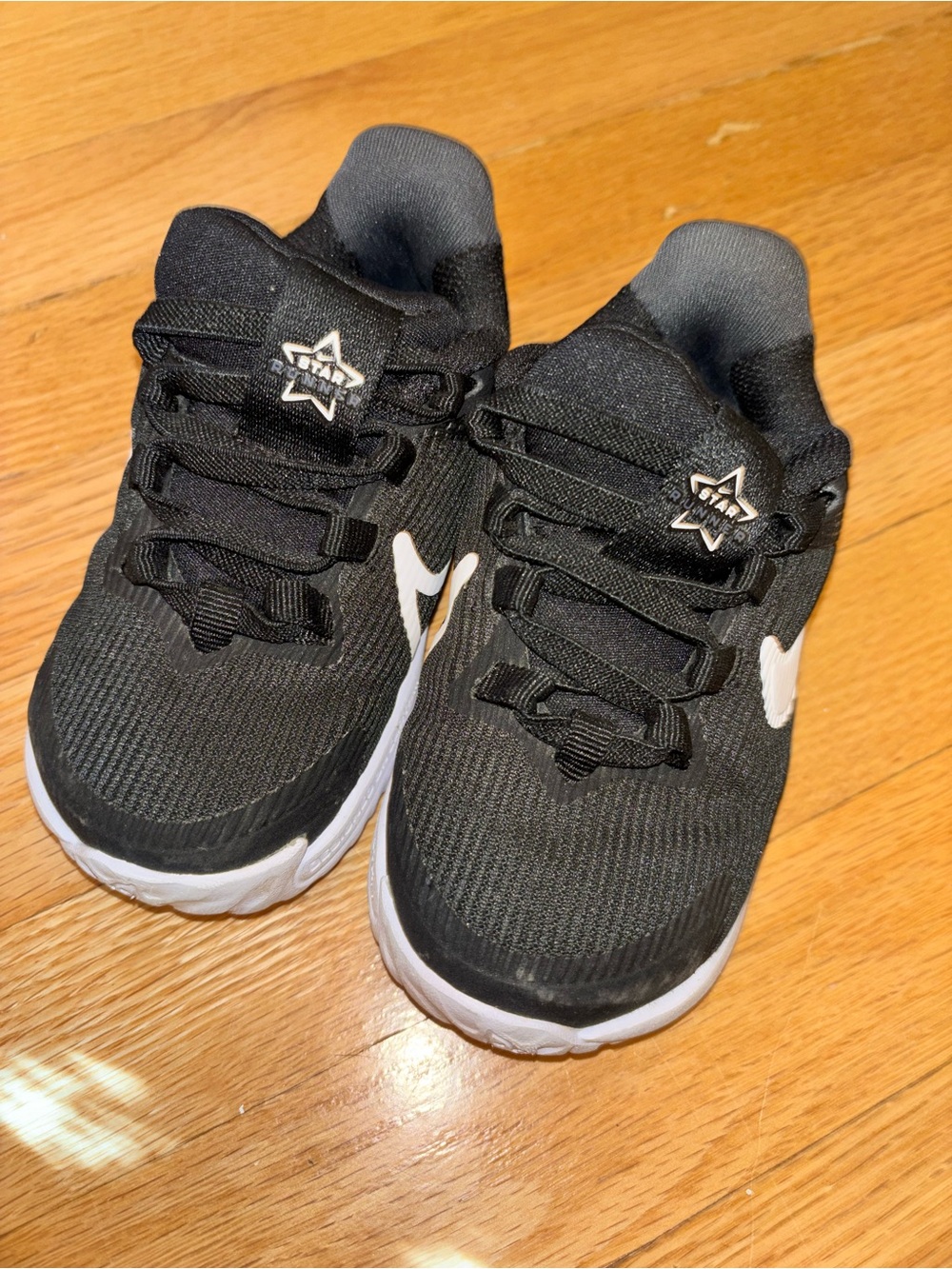 Nike Toddler Black Sneakers with White Swoosh